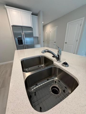 14910 HARVEST STREET, Orlando, FL 32824