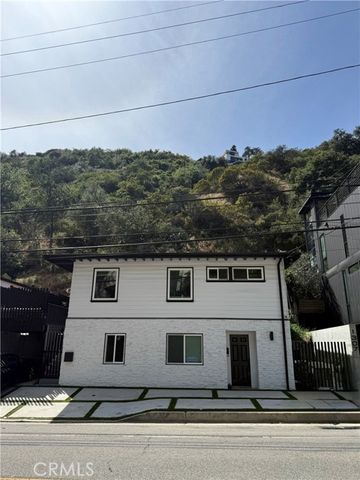 1303 N Beverly Glen Boulevard, Los Angeles, CA 90077