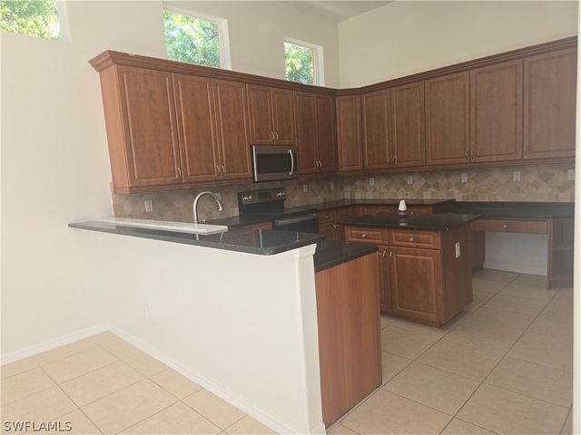 1440 16th AVE NE, Naples, FL 34120