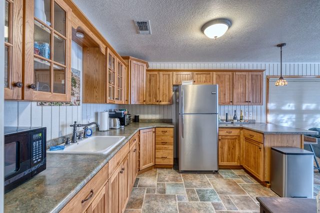 416 Cold Springs River Dr, Concan, TX 78873