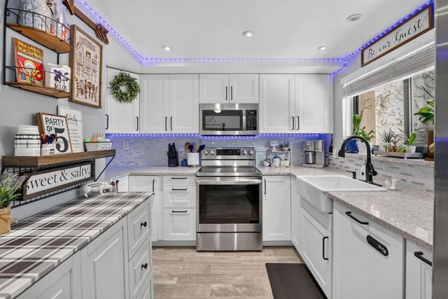 124 Wimbledon Lake Drive, Plantation, FL 33324