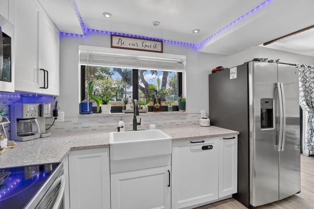 124 Wimbledon Lake Drive, Plantation, FL 33324