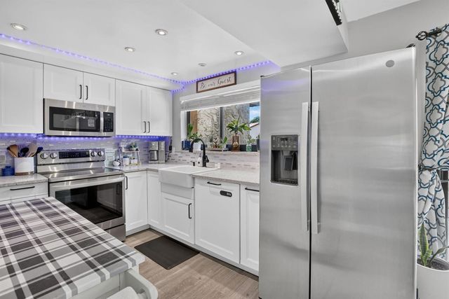 124 Wimbledon Lake Drive, Plantation, FL 33324