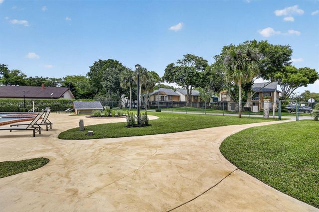 124 Wimbledon Lake Drive, Plantation, FL 33324