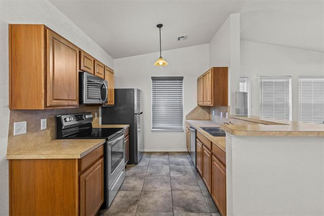 9101 Checkerbloom Drive, Oklahoma City, OK 73165