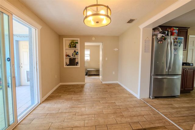 1050 DEAL LANE, Holiday, FL 34691