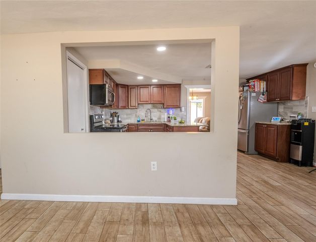 1050 DEAL LANE, Holiday, FL 34691