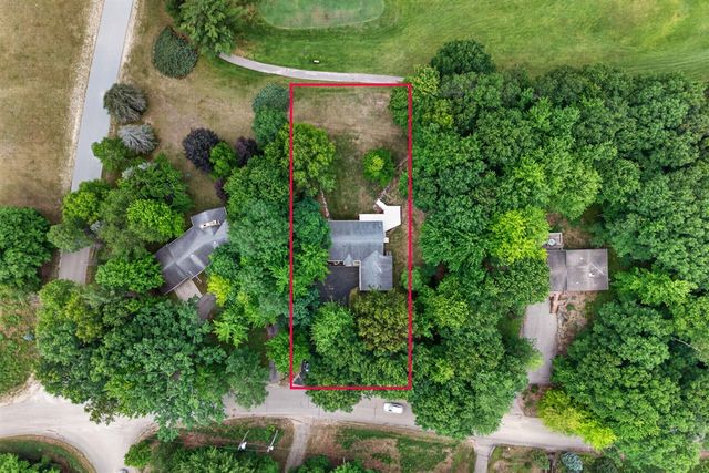 9265 Golf Port Drive, Canadian Lakes, MI 49346