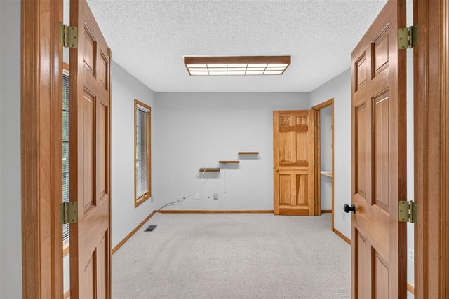 9265 Golf Port Drive, Canadian Lakes, MI 49346