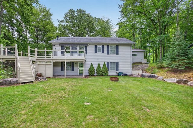 9265 Golf Port Drive, Canadian Lakes, MI 49346