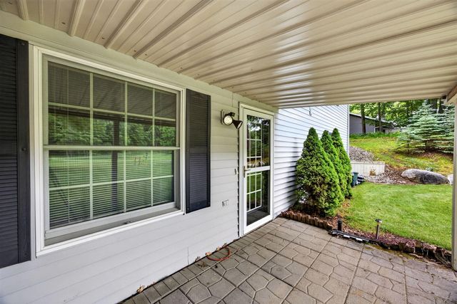 9265 Golf Port Drive, Canadian Lakes, MI 49346