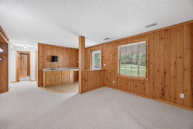 9265 Golf Port Drive, Canadian Lakes, MI 49346