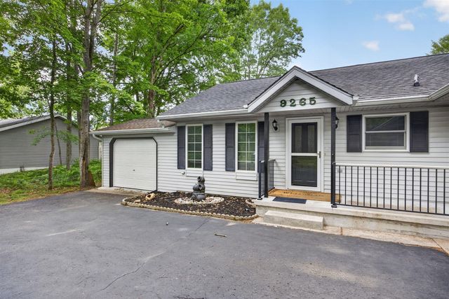 9265 Golf Port Drive, Canadian Lakes, MI 49346