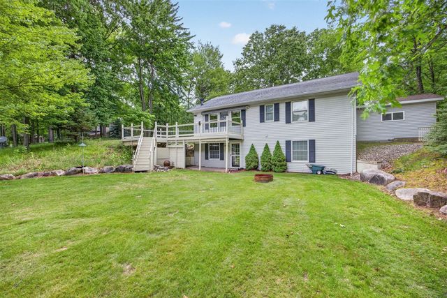 9265 Golf Port Drive, Canadian Lakes, MI 49346