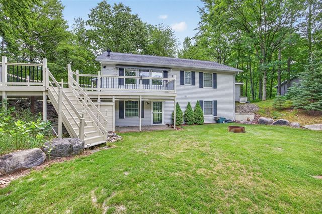 9265 Golf Port Drive, Canadian Lakes, MI 49346