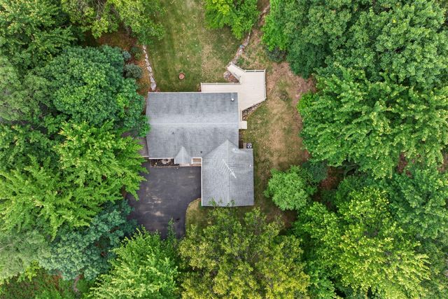 9265 Golf Port Drive, Canadian Lakes, MI 49346