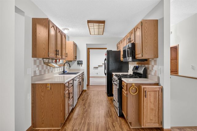 9265 Golf Port Drive, Canadian Lakes, MI 49346