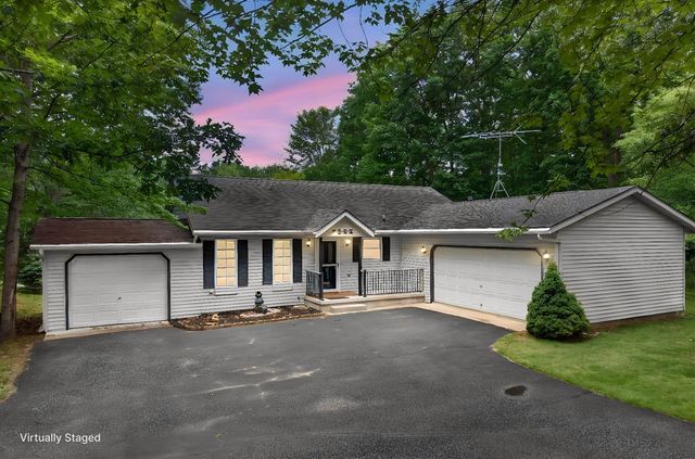 9265 Golf Port Drive, Canadian Lakes, MI 49346