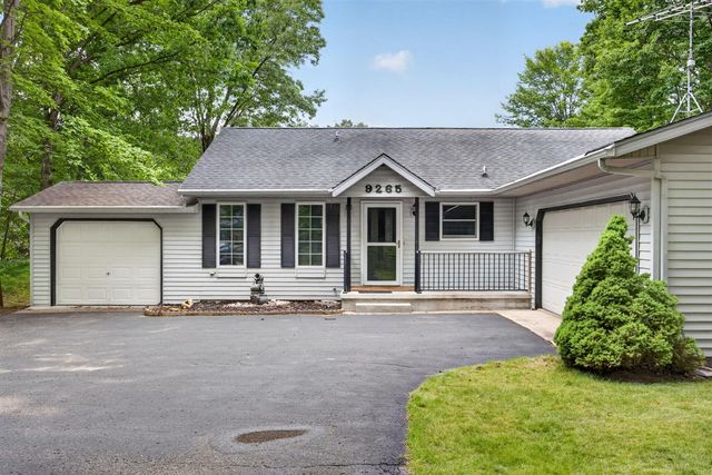 9265 Golf Port Drive, Canadian Lakes, MI 49346