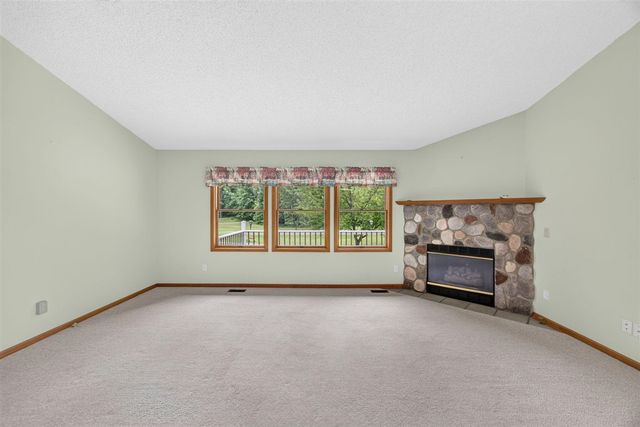 9265 Golf Port Drive, Canadian Lakes, MI 49346