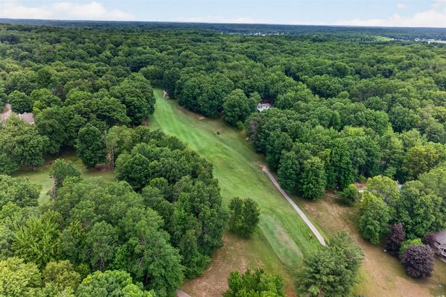 9265 Golf Port Drive, Canadian Lakes, MI 49346