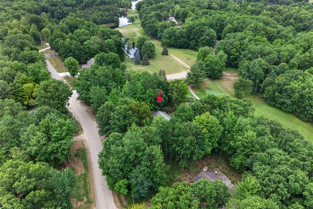9265 Golf Port Drive, Canadian Lakes, MI 49346