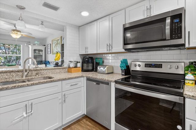 1146 KING ARTHUR COURT 110, Dunedin, FL 34698