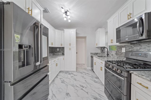 8927 Carlyle Avenue, Surfside, FL 33154