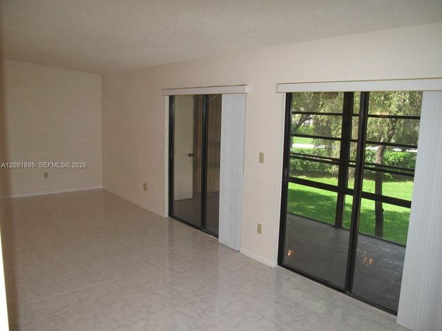 9940 S Belfort Circle 203, Tamarac, FL 33321