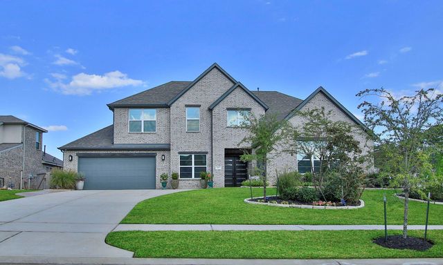 902 Falcon Hollow Lane, Pinehurst, TX 77362
