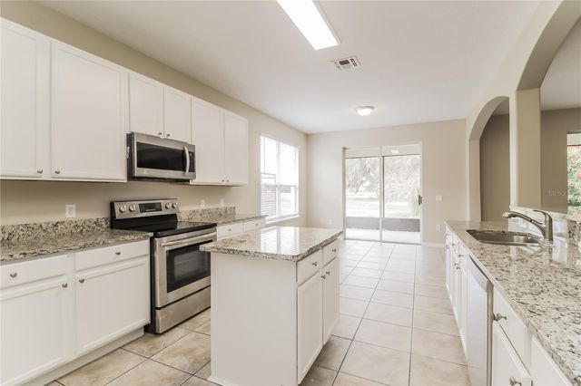 2114 THE OAKS BOULEVARD, Kissimmee, FL 34746