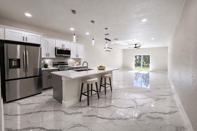 2423 MILTON AVENUE S, Lehigh Acres, FL 33973