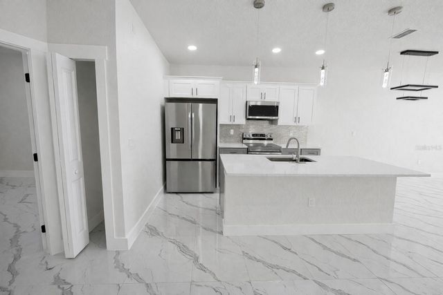 2423 MILTON AVENUE S, Lehigh Acres, FL 33973