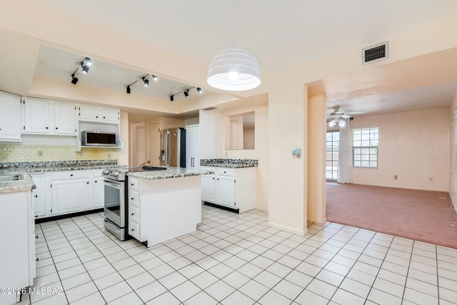 8449 E Agape Drive, Tucson, AZ 85715