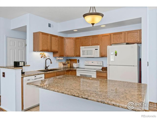 2003 Grays Peak Drive 101, Loveland, CO 80538