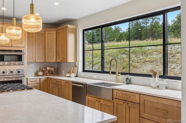 21761 Falcon Wing Road, Indian Hills, CO 80454