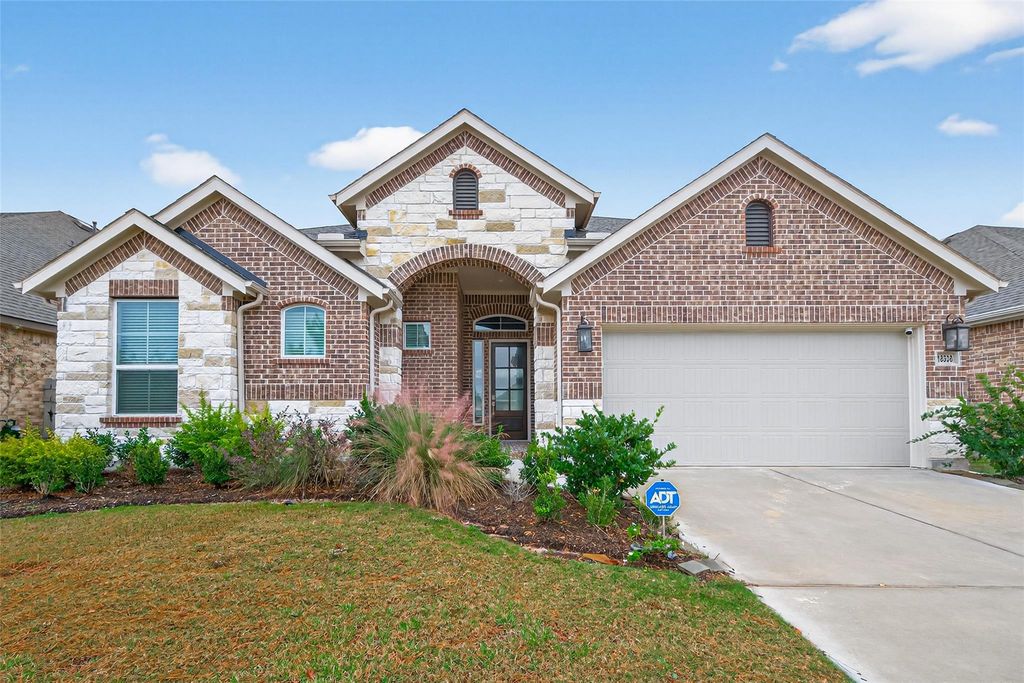 18338 Tiger Flowers Drive, Conroe, TX 77302