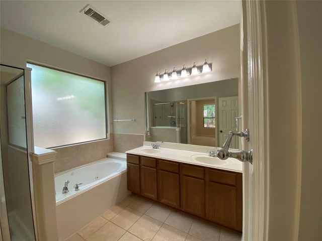 6018 Sugar Bush Drive, Magnolia, TX 77354