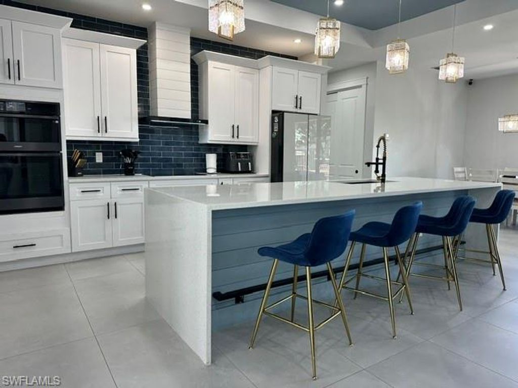1013 Chaplin AVE, LEHIGH ACRES, FL 33971 — exterior