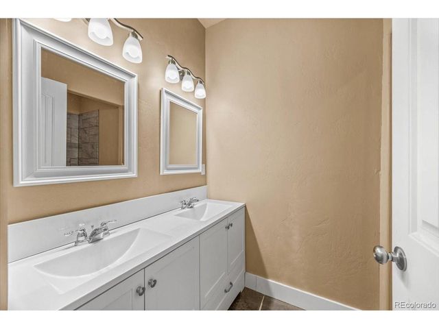 45425 Wolf Creek Dr, Bennett, CO 80102