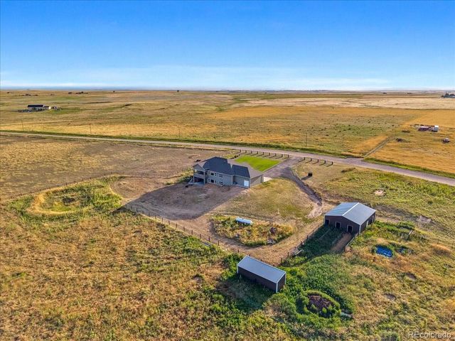 45425 Wolf Creek Dr, Bennett, CO 80102
