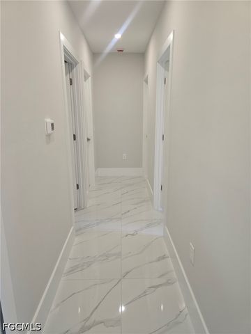 457 Woodman DR, Lehigh Acres, FL 33972
