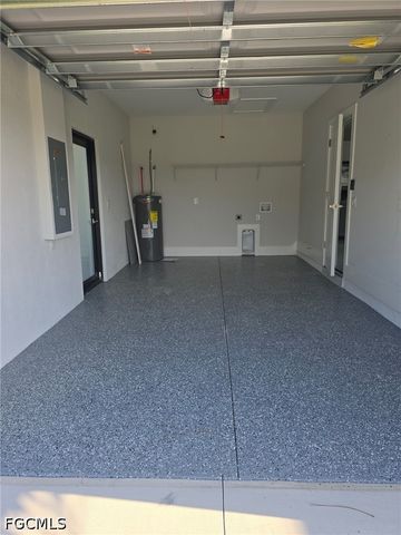 457 Woodman DR, Lehigh Acres, FL 33972
