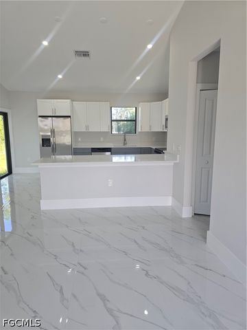 457 Woodman DR, Lehigh Acres, FL 33972