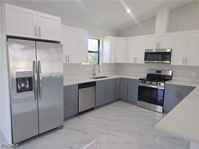 457 Woodman DR, Lehigh Acres, FL 33972