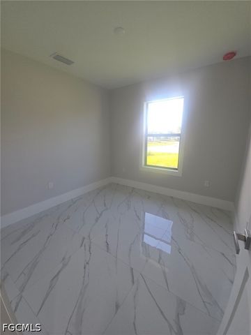 457 Woodman DR, Lehigh Acres, FL 33972