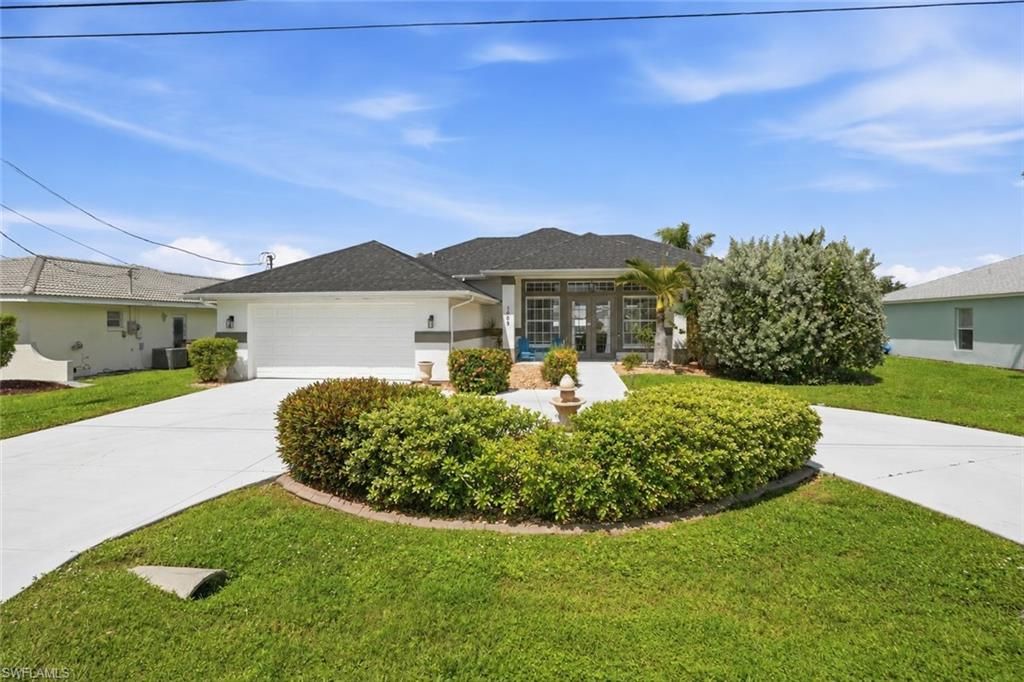 1409 SE 36th TER, CAPE CORAL, FL 33904 — exterior