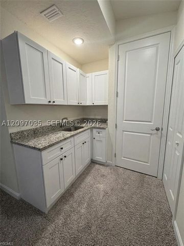 2614 27th ST W, Lehigh Acres, FL 33971
