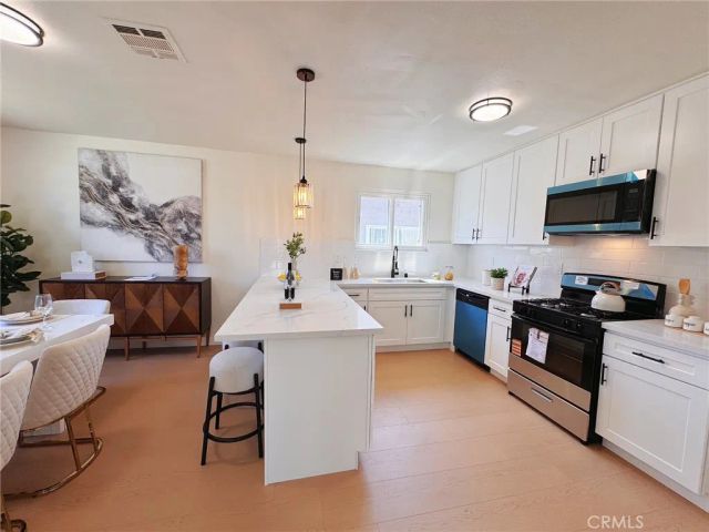 8633 Cimarron Street, Los Angeles, CA 90047