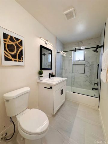 8633 Cimarron Street, Los Angeles, CA 90047